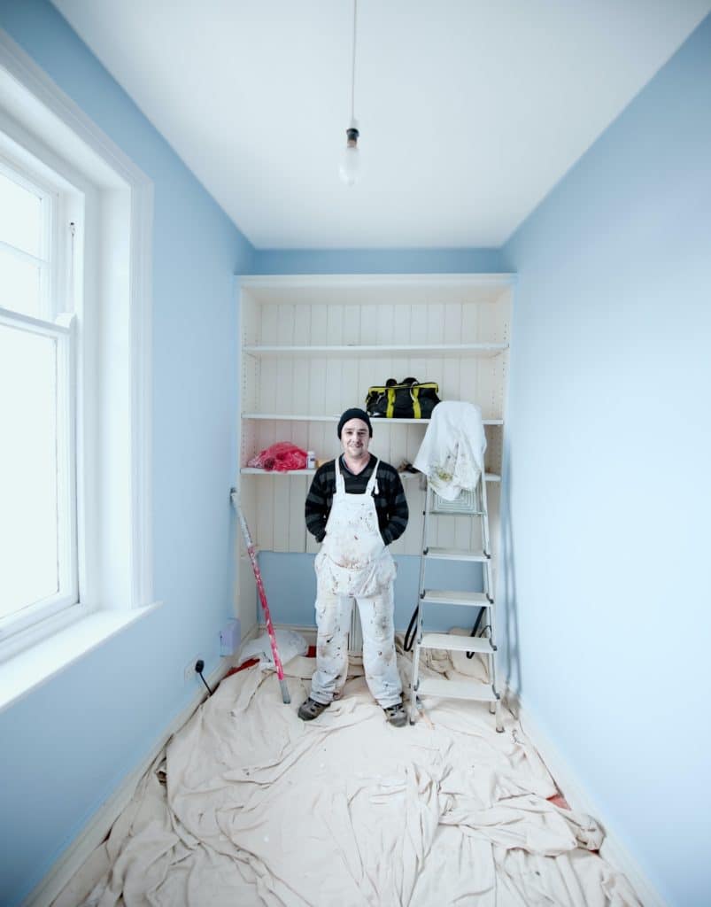 Painter and decorator wearing overalls