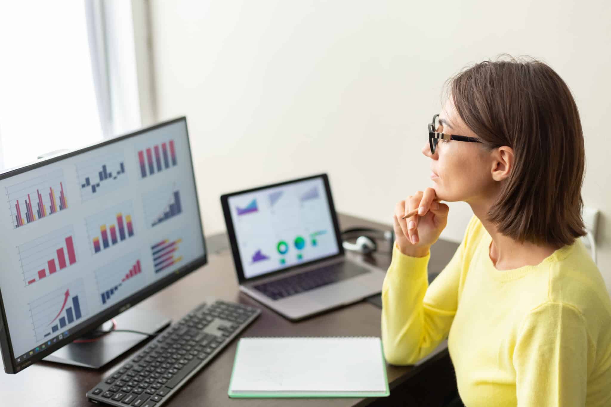 Financial advisor reviewing business analytics dashboard