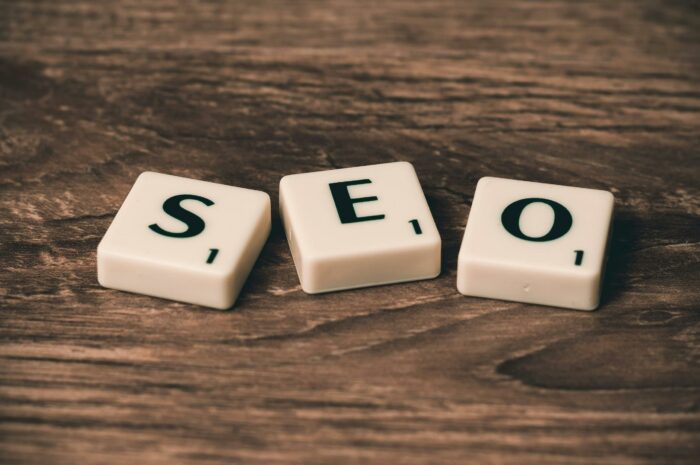 Two dice with the word seo spelled on them