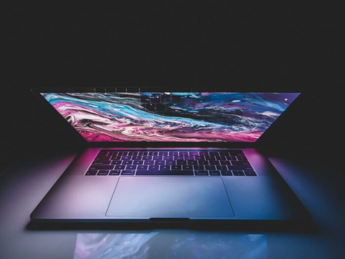 Laptop with a purple and blue design on the screen