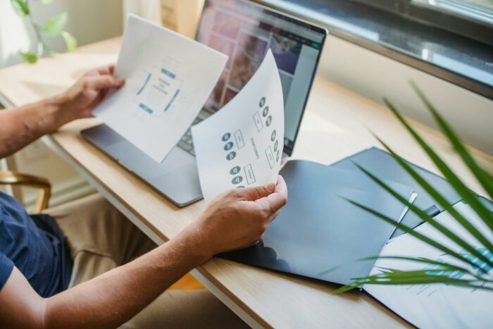 Man sitting at a desk with a laptop