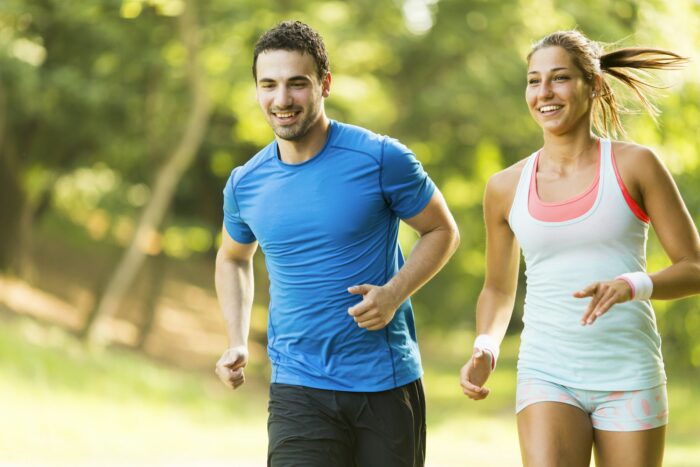 Young couple running