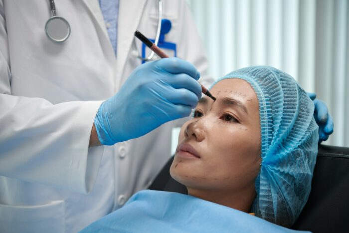 Plastic Surgeon Marking Areas