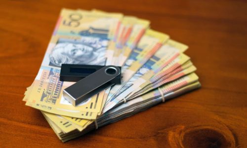 Australian dollars and nano wallet on the desk Australian dollars and nano wallet on the desk