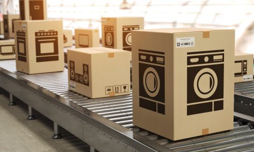 Household appliance in cardboard boxes on conveyor roller in dis Household appliance in cardboard boxes on conveyor roller in dis